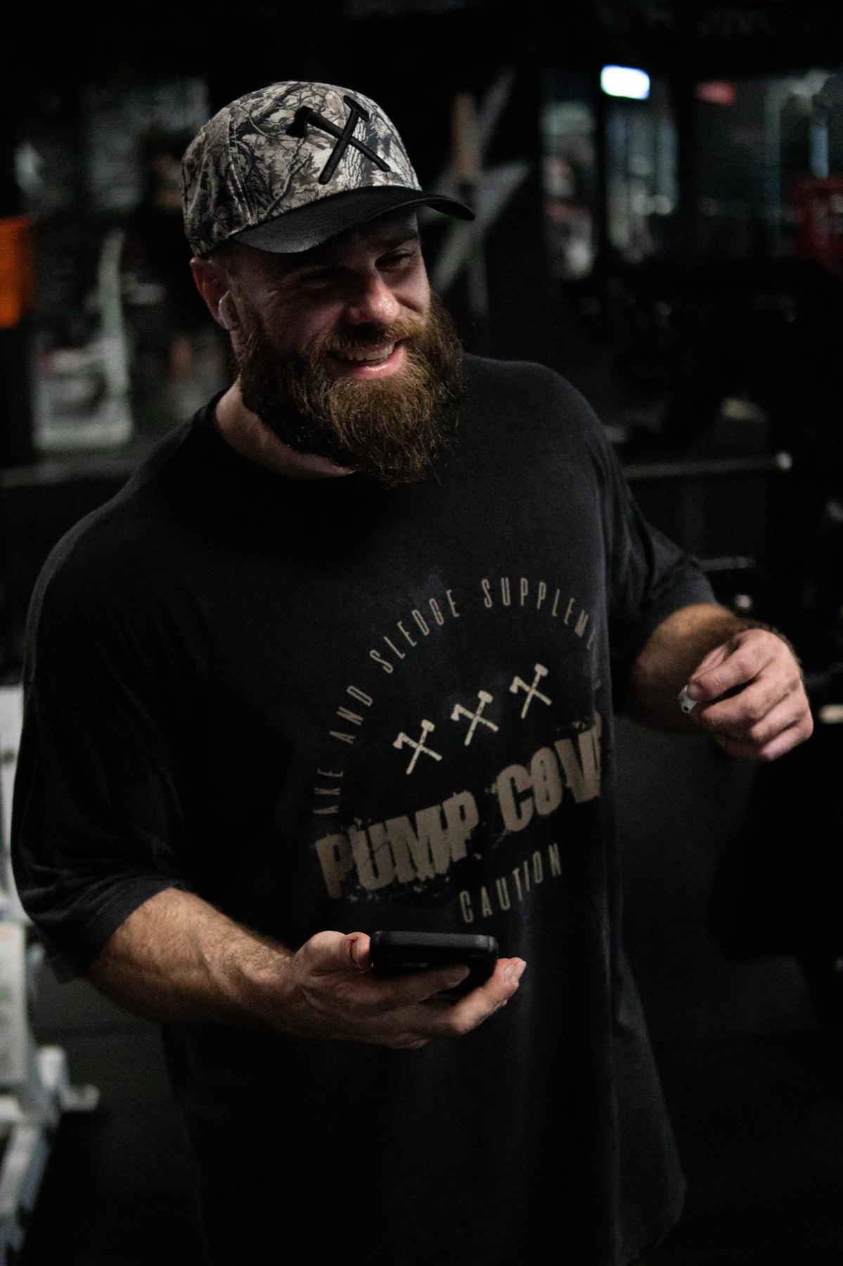 Russell Holland smiling behind the scenes during a media session
